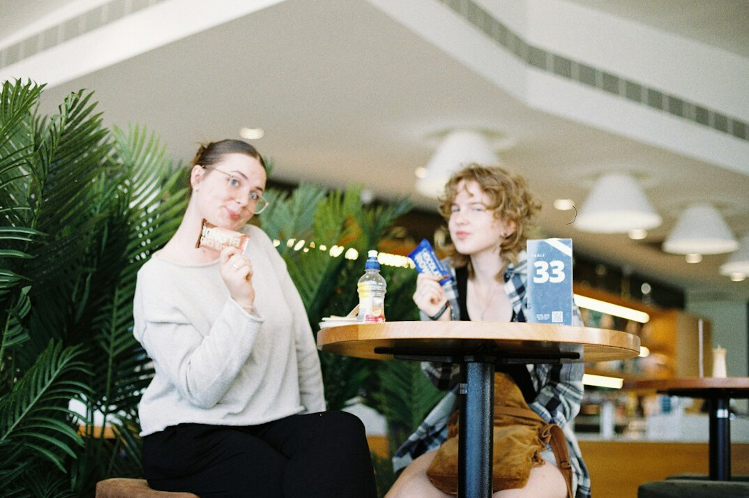two people arguing in cafe